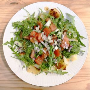 Fried potatoes with arugula and pesto at Cafe Fleischlos in Essen