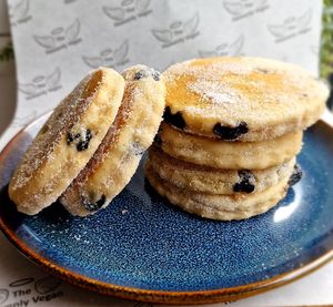 Who could resist the allure of our Blueberry and Lemon Welsh Cakes? These scrumptious treasures are a true embodiment of plant-based perfection. Packed with luscious blueberries. at Heavenly Vegan Coffi in Barry