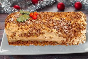Get ready to sleigh this Christmas with our irresistible Biscoff Yule Log! Made with a heavenly combination of Biscoff sponge and rich ganache, this festive treat. at Heavenly Vegan Coffi in Barry
