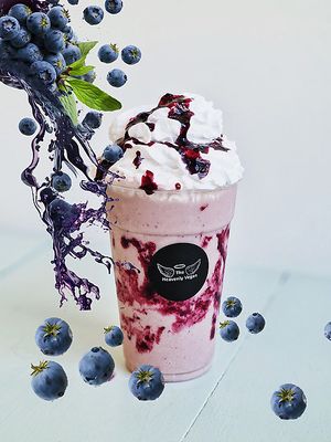 Quench your thirst and satisfy your sweet tooth with our delectable Blueberry Milkshake, the ultimate Summer refreshment. Made with real blueberries and blended to perfection. at Heavenly Vegan Coffi in Barry