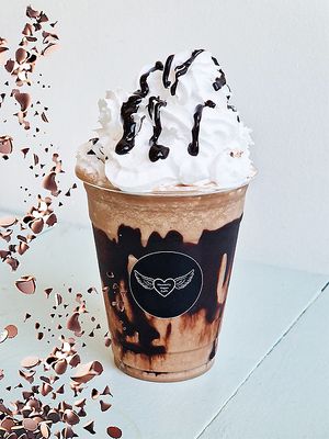 Treat yourself to a luxurious experience with our Chocolate milkshake when you need Decadence. Made with premium chocolate and Plant milk, this shake is a heavenly delight. at Heavenly Vegan Coffi in Barry