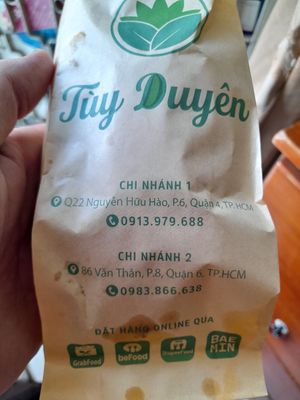 Banh mi bag with contact info at Tuy Duyên in Ho Chi Minh City