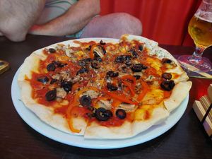 Mushrooms, black olives, red bell pepper and no cheese at all at BisuPizza in Madrid