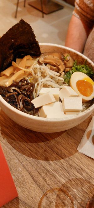Miso Vegetarian Ramen (with extra noodles)
(Light veggie dashi from kombu & shiitake with umami miso tare, silken tofu, marinated egg, menma, soy sprouts, nori & mushrooms)
€16 at Umamido - Vooruit in Ghent
