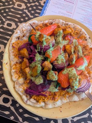 Roasted pepper and onion flatbread. Aubergine hummus, salsa, butternut squash, cabbage, onion and a coriander sauce/dressing. SO GOD DAMN GOOD at Oppio Lounge in Altrincham