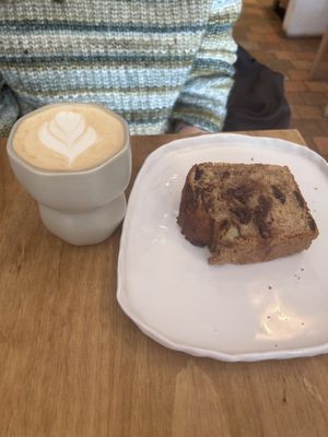 Banana bread and honey latte with oat milkk  at Helen's Book in Paris