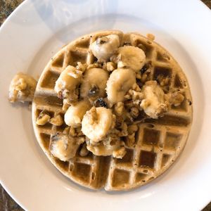 Delicious! Vegan Belgian waffle with walnuts, banana and maple syrup. Mmmm.  at Fresh First - Maybe closed in Fort Lauderdale