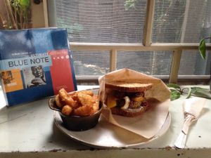 Veggie Burger and fries with a side of Jazz at Beach Muffin in Zushi
