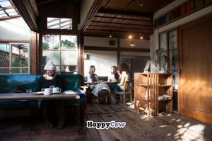 inside, two dining areas - this is the quiet area, the lower part down by kitchen has music and is fun to people watch at Beach Muffin in Zushi