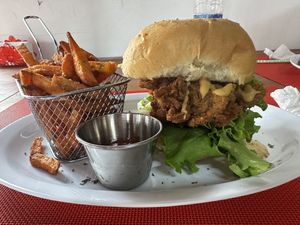 Oyster mushroom burger - amazing   at Soigné Vegan Garden in St Johns