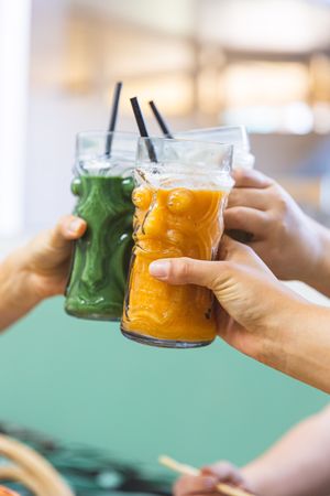 Cheers with our smoothies at Plant Based Paradise - Kaka'ako in Honolulu