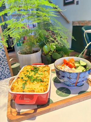 Creamy 'Fish' Pie - Banana Blossom marinated in Seaweed & Smoked Tofu, served with a house salad at The Botanical Kitchen in Bowness-on-windermere