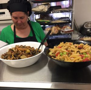 Mrs Pat and her delicious homemade pasta and roasted veggies at Vegan Take Out Plus in Tampa