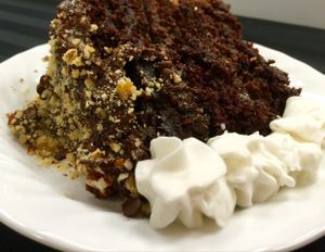 TRIPLE LAYER CHOCOLATE CAKE WITH PECANS, WALNUTS AND VEGAN CHOCOLATE CHIPS! at Vegan Take Out Plus in Tampa