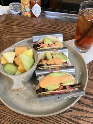 Vegan Mushroom Tacos (labeled vegan) sub seasonal fruit for chips. Perfect if you do not eat big lunches    at Prairie Kitchen & Bar in Minneapolis