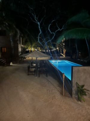 Seating goes through the middle of the boutique hotel up to the beach   at Arca in Roatan