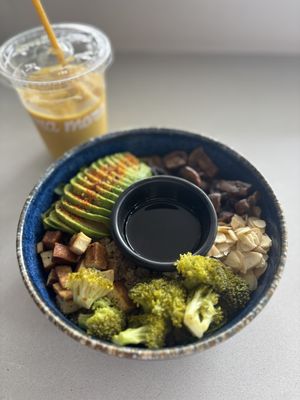 Teriyaki tofu bowl and turmeric mango smoothie   at Mora Mora  in Mexico City