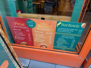 But menu also in the window and above the counter! at Eat a Pitta in Bath