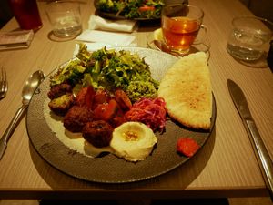 The Plant More Plate with falafel, hummus and pita at plant more in Tokyo