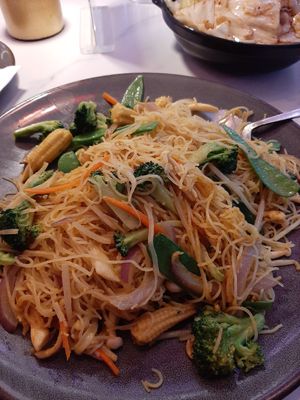 Curry-spiced noodle stir-fry (this unfortunately came with egg, which wasn't noted on the menu, so be sure to ask for them to exclude it if you're vegan) at The Corner in New York City