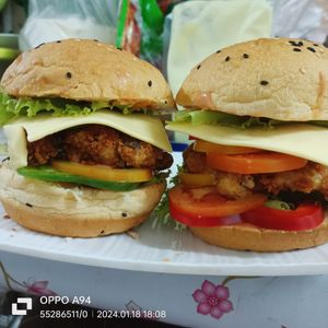 We make our vegan burger patties with legumes, soy beans, and mushrooms! . at White Lotus Vegetarian Restaurant in Vientiane