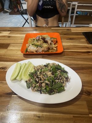 Papaya salad (up) Lao style duck salad (down)  at White Lotus Vegetarian Restaurant in Vientiane