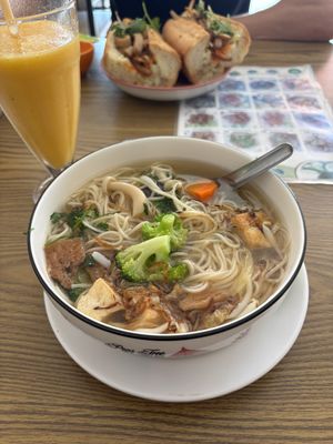 Yellow noodle soup  at White Lotus Vegetarian Restaurant in Vientiane