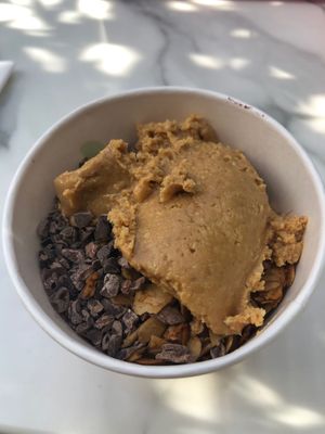 Banana blend with cocoa nibs, peanut butter and granola  at The Acai Spot - DIFC  in Dubai