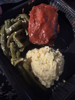 Impossible meatloaf with garlic green beans, herb and roasted garlic mashed potatoes with mushroom gravy   at Everything POP Shopping & Dining in Lake Buena Vista