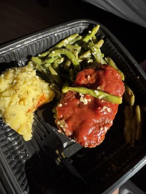 Impossible meatloaf with garlic green beans, herb and roasted garlic mashed potatoes with mushroom gravy   at Everything POP Shopping & Dining in Lake Buena Vista