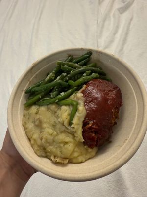 Impossible meatloaf with mashed potatoes and green beans at Everything POP Shopping & Dining in Lake Buena Vista