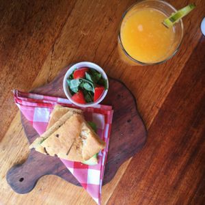 Avo on toast and fresh orange juice at Green Point in Cusco