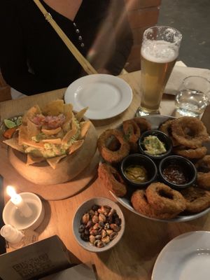 Guac and onion rings  at Green Point in Cusco
