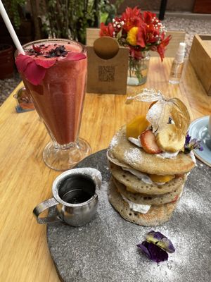 Banana pancakes and strawberry juice  at Green Point in Cusco