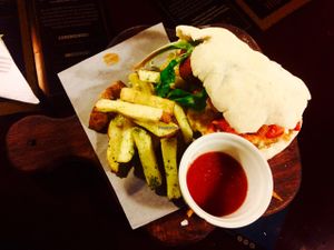 Homemade pita bread falafel with herb crusted chips and fresh tomato sauce ❤️ at Green Point in Cusco