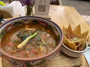 Lentil soup with Oyster mushrooms, with chips and guacamole. The guacamole was heavenly!  at Green Point in Cusco