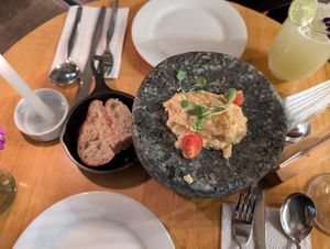 Complimentary hummus and sourdough at Green Point in Cusco