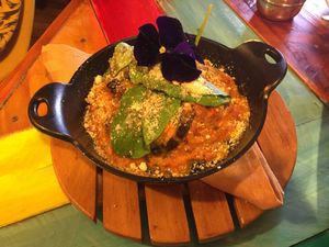 Eggplant lasagna with vegetable’s sausage, tomato sauce and cashews nuts. at Green Point in Cusco