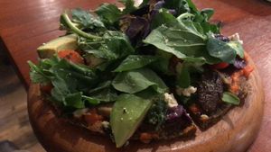 Raw vegan pizza (recommend)  at Green Point in Cusco