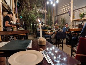 Courtyard dining, but heated, and they have blankets at Green Point in Cusco