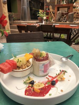 Cashew yoghurt with muesli and fruit. Outstanding! at Green Point in Cusco