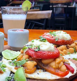 Definitely get the pisco sour!! The tacos are with beans and sautéed veggies, tomato and hummus, topped with vegan Parmesan. The tacos were good, but I liked my other choices more at Green Point in Cusco