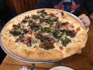 Vegan special with tomatoes,  balsamic portobello mushrooms, and crispy kale! at Flatbread Company in North Conway