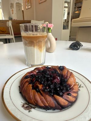 Iced latte with oat milk and blueberry pastry at Kaffe Bageri Stockholm in Krakow