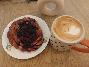 Jagodzianka and an oat flat white at Kaffe Bageri Stockholm in Krakow