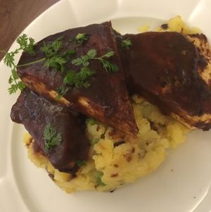 tofu with BBQ sauce made from apples. with mash potato with veg at Plevel in Prague