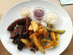 BBQ seitan with american potatoes and horseradish at Plevel in Prague