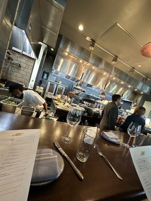 Chef’s table view of main kitchen   at The Kingstide in Charleston