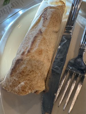 Inside this, there’s vegetables and roasted cauliflower. I recommend ordering a side of hummus to add to it.  at Aladdin's Eatery in Powell