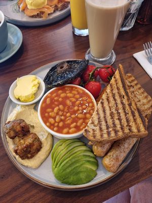 **menu update** vegan breakfast now has a mediterranean twist - falafel and hummus.  There are vegan sausages and hash brown hiding under the toast at Mortimer Bistro in Reading
